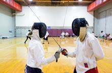 Participants dressed as fencer during camp.